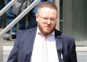 Bank worker who attacked partner