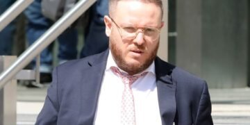 Bank worker who attacked partner